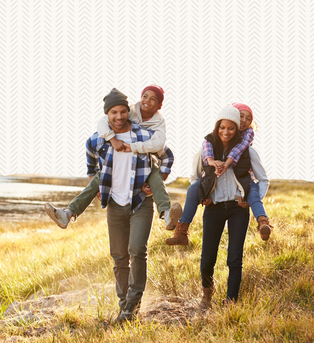 A family enjoying an outdoor activity, symbolizing resilient health and long-term vitality